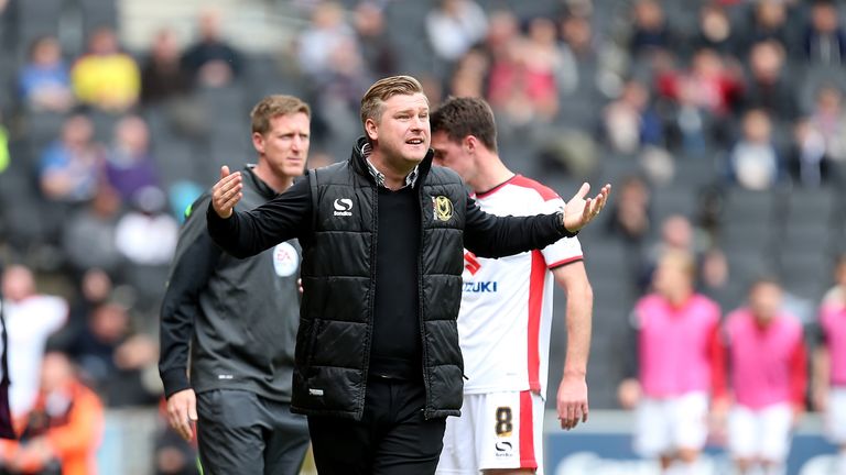 MK Dons manager Karl Robinson puts huge trust in his scouts
