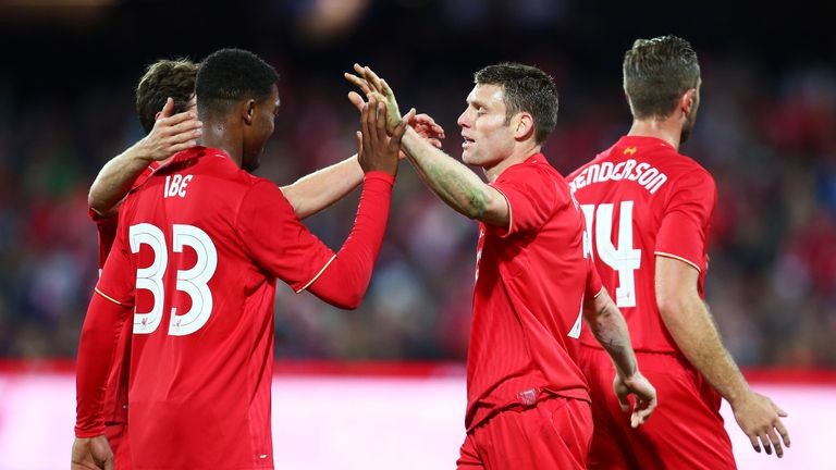 James Milner celebrates with Jordan Ibe after scoring Liverpool's opener