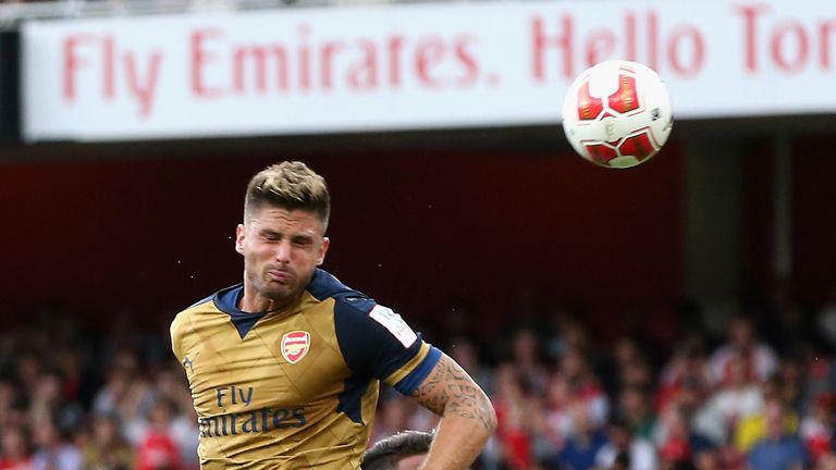 Giroud heads Arsenal in front against Lyon