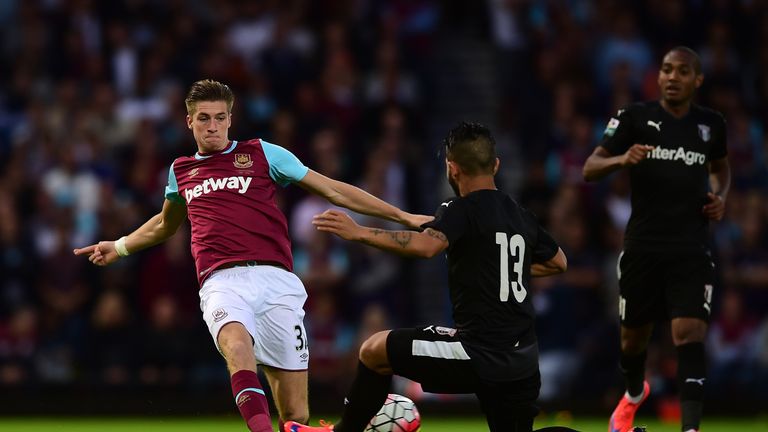 Reece Burke of West Ham battles for the ball against FC Astra.