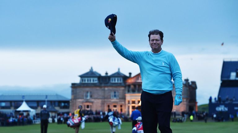 Tom Watson waves to the crowd from Swilcan Bridge on his final Open appearance 