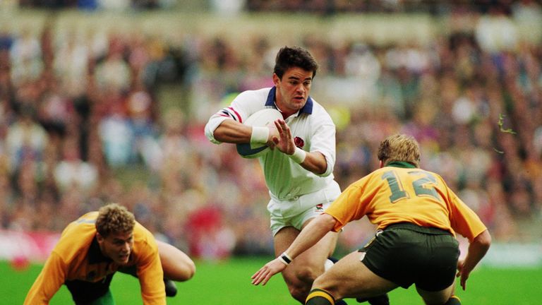 Will Carling takes on Tim Horan during the 1991 World Cup final