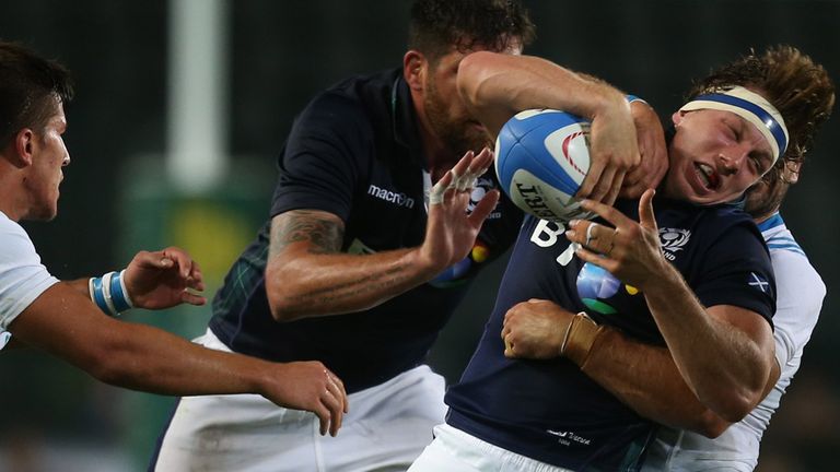 Scotland's Hamish Watson tries to find a breakthrough against a stubborn Italy 