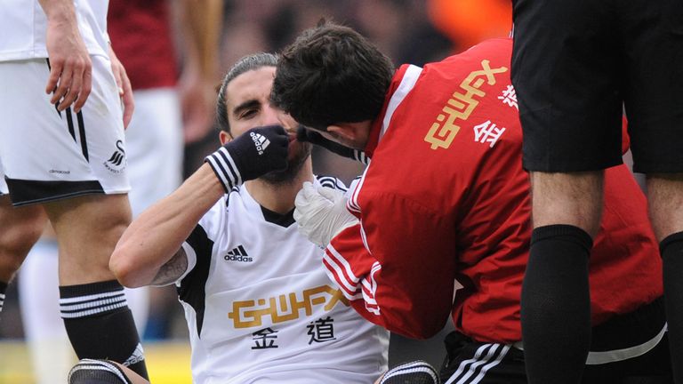 Andy Carroll was sent off after appearing to catch Swansea's Chico Flores with his arm in 2014, but the decision was not overturned despite an appeal. If it had been overturned, Flores would now face a possible FA ban