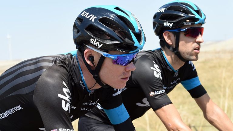 Chris Froome (left), riding alongside Mikel Nieve, gained time of his rivals on stage