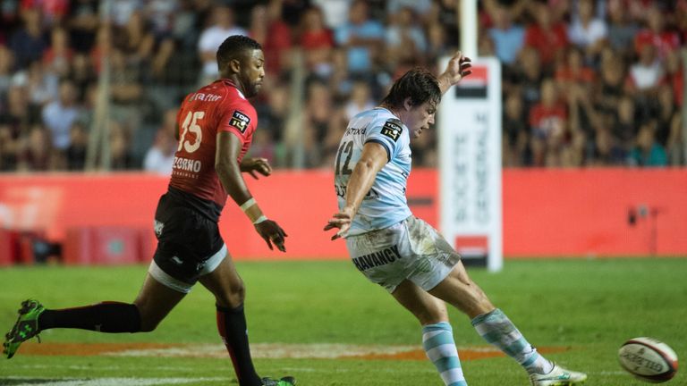 Racing 92's Henry Chavancy (R) vies with RC Toulon's full-back Delon Armitage