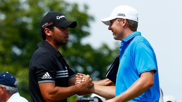 Jason Day greets Jordan Spieth on the first tee