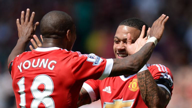 Memphis Depay (right) celebrates with Ashley Young