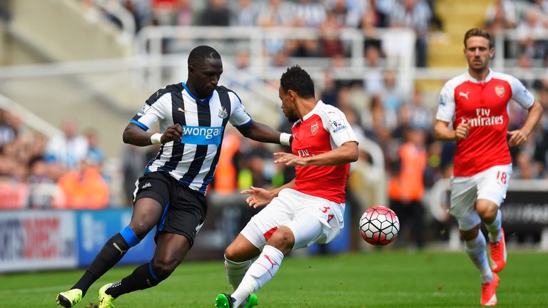 Moussa Sissoko (left) competes for the ball with Francis Coquelin (middle)