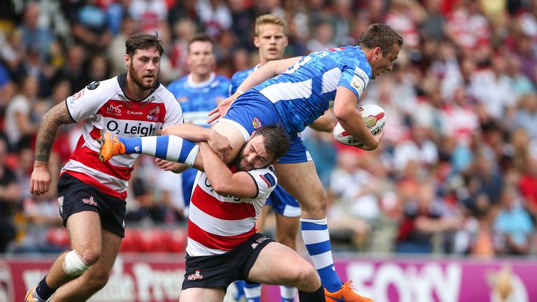 Wakefield's Lee Smith is tackled by Martyn Ridyard