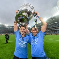 Brothers Bernard and Alan Brogan celebrate with the Sam Maguire Cup