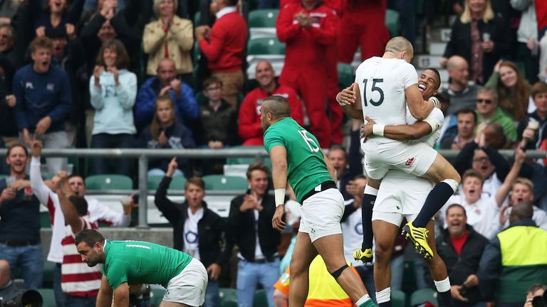 Anthony Watson of England celebrates scoring the second try with Mike Brown