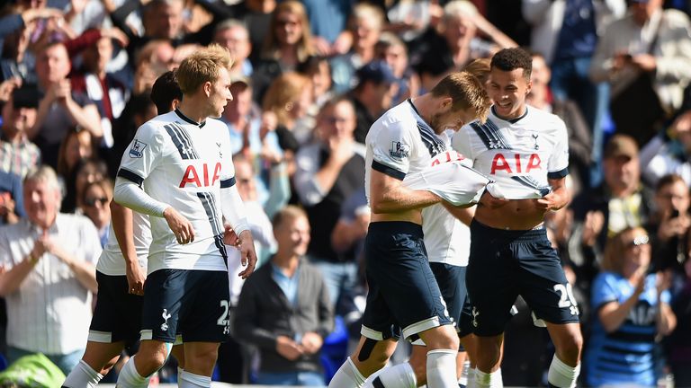 Eric Dier (middle) of Tottenham celebrates scoring his team's first goal