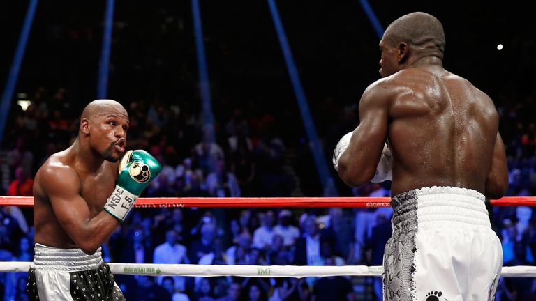 Floyd Mayweather goades Andre Berto during their welterweight showdown in Las Vegas earlier this month