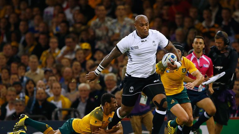 Nemani Nadolo of Fiji is tackled by Will Genia