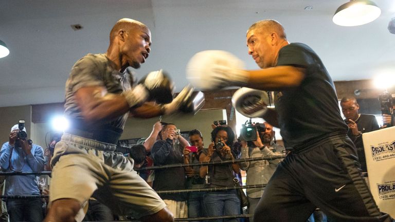Timothy Bradley (L) and trainer Joel Diaz (R) have gone separate ways