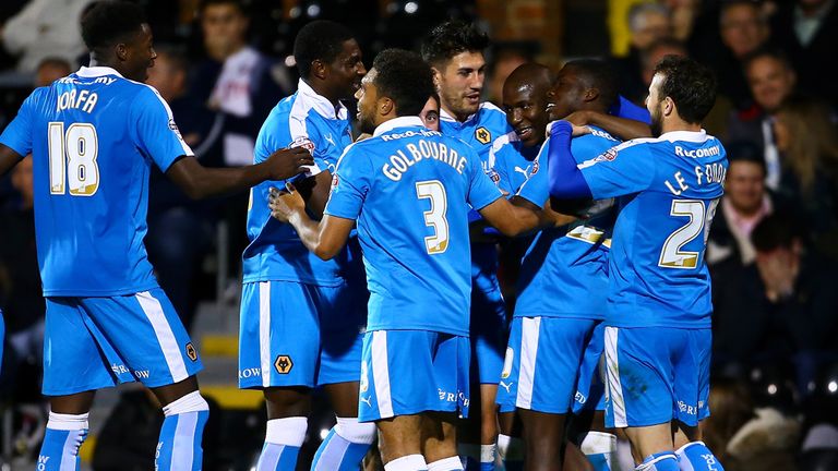 Sheyi Ojo of Wolves celebrates after he scores to make it 2-0 against Fulham
