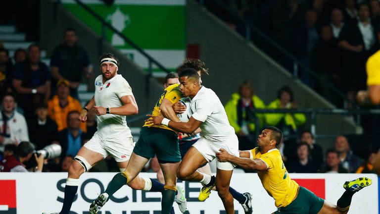 Anthony Watson (middle) scored a try to raise hopes of an England comeback
