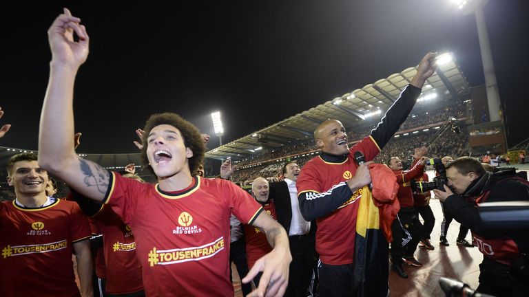Vincent Kompany (right) celebrated Euro 2016 qualification after playing an hour against Israel