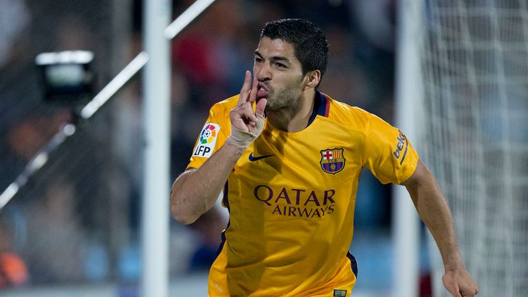 Luis Suarez celebrates scoring their opening goal