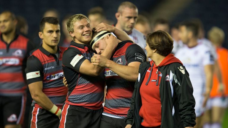 Edinburgh players celebrate after the final whistle