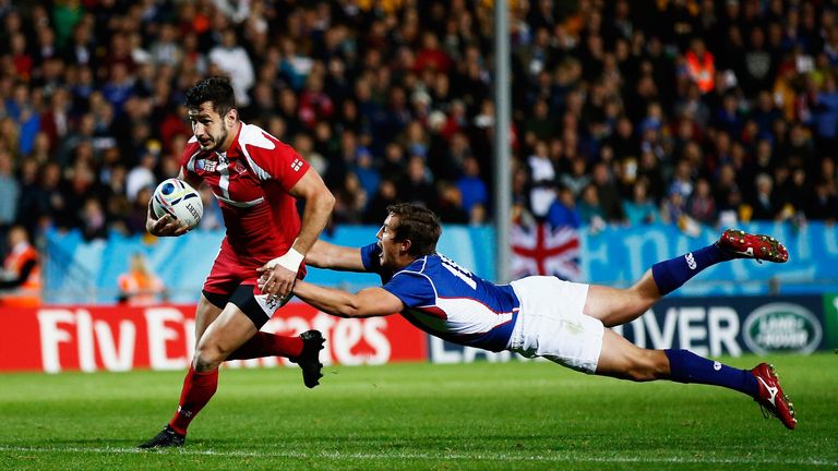 Lasha Malaguradze breaks past Theuns Kotze to score Georgia's second try