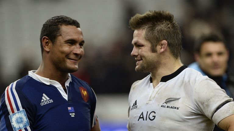 Thierry Dusautoir chats with Richie McCaw after the All Blacks' win in Paris in 2013