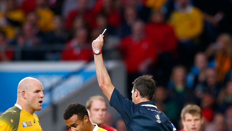 Will Genia is shown a yellow card by referee Craig Joubert