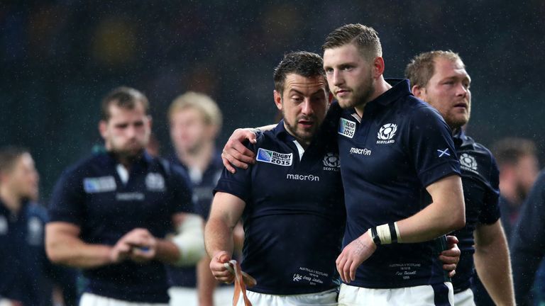 Greig Laidlaw (left) and Finn Russell are dejected as Scotland suffer World Cup heartbreak against Australia