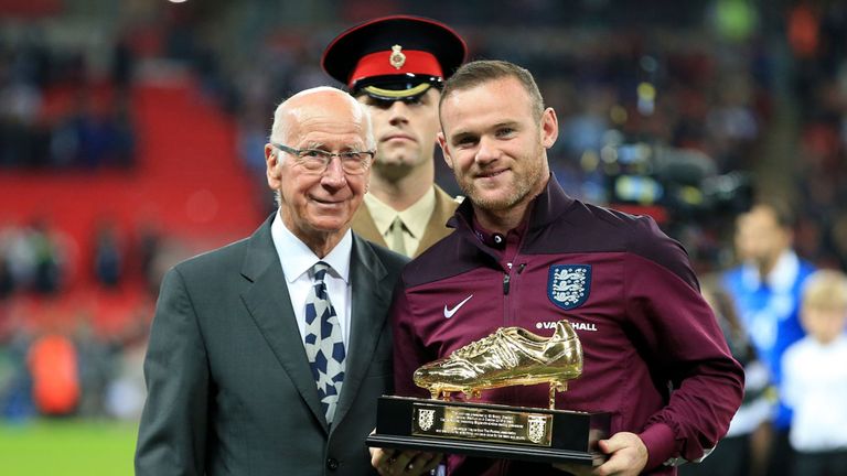 Sir Bobby Charlton presented Rooney with a golden boot