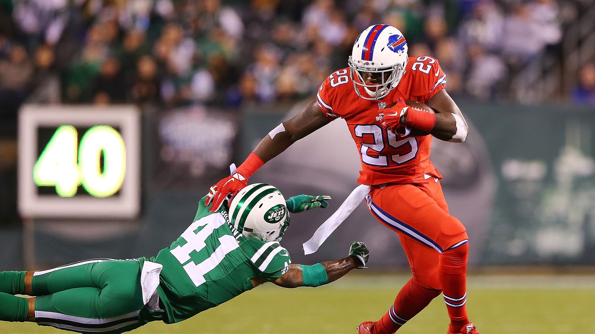 New York Jets quarterback Brad Smith runs out of the pocket against the  Buffalo Bills in week 17 of the NFL season at New Meadowlands Stadium in  East Rutherford, New Jersey on