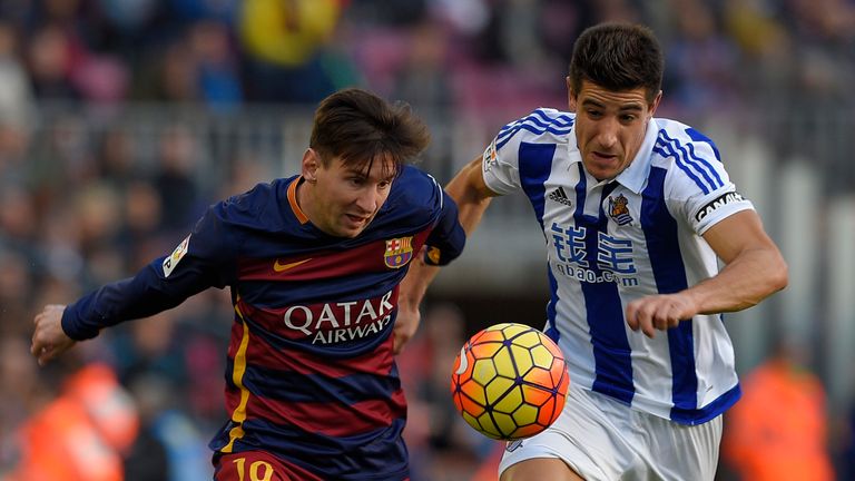 Lionel Messi battles for the ball in Barcelona's win