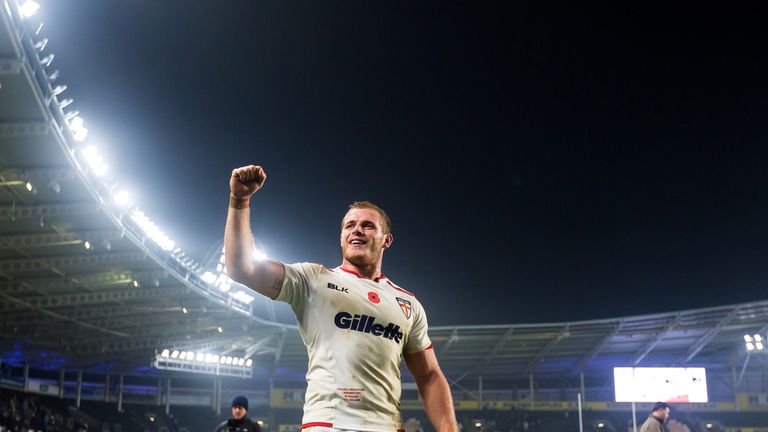 Tom Burgess celebrates England's win over New Zealand