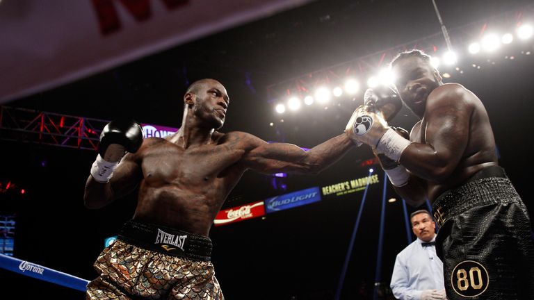 Deontay Wilder (L) is trading insults with new champion Tyson Fury