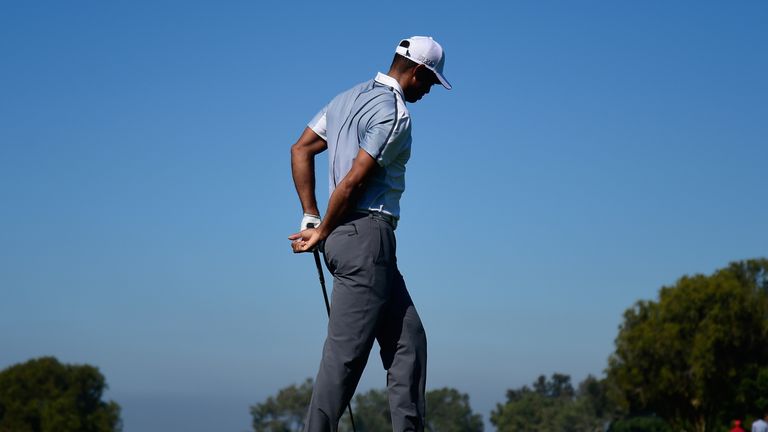 Back problems forced Woods to withdraw mid-round during the Farmers Insurance Open in February 2015