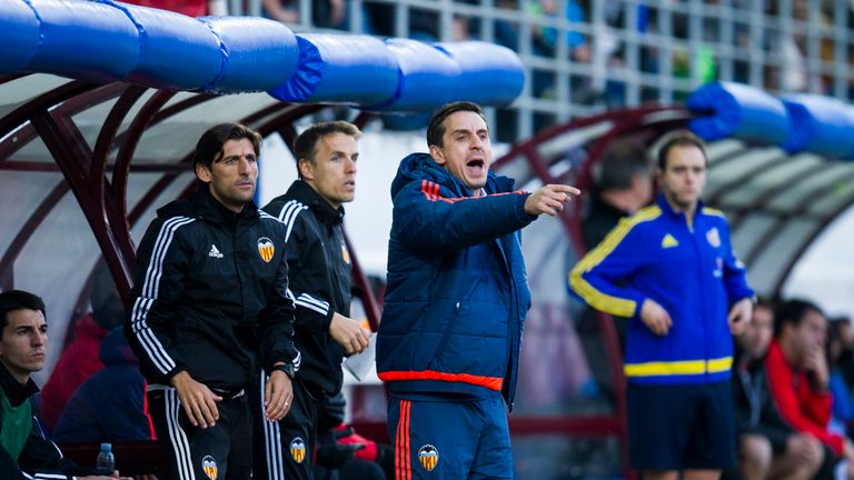 Neville (middle) is happy with the effort and desire of his players