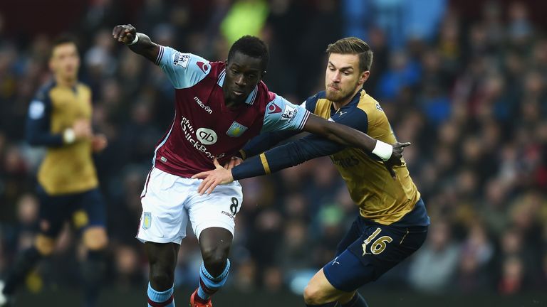 Idrissa Gueye holds off Ramsey at Villa Park