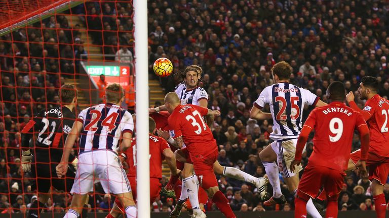 Jonas Olsson puts West Brom ahead with a second-half header against Liverpool