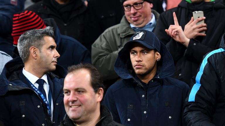 Neymar looks on from the stand during Barcelona's clash at Leverkusen