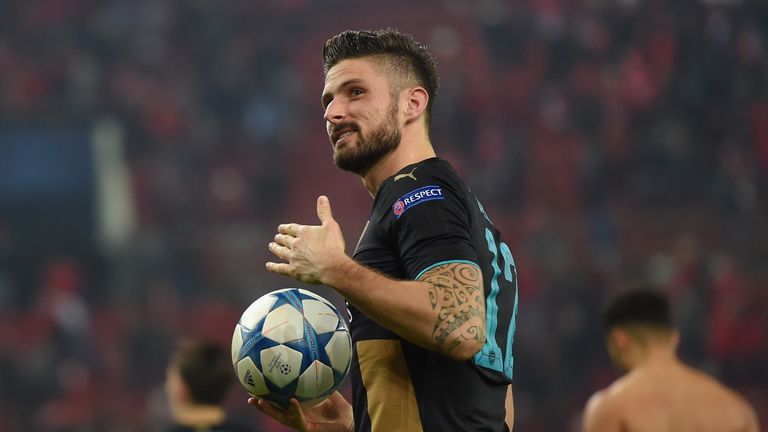 Arsenal hat-trick hero Olivier Giroud celebrates at the final whistle in Pireaus