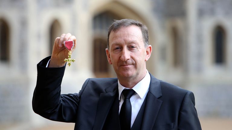 Swansea City chairman Huw Jenkins collected an OBE on Tuesday