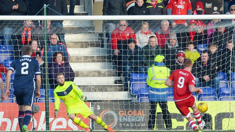 Adam Rooney (right) scores from the spot to draw Aberdeen level