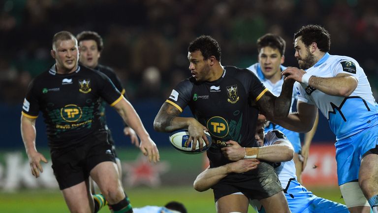 Courtney Lawes looks to offload as he charges upfield