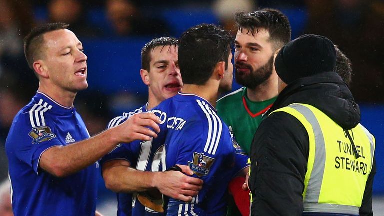 Diego Costa squares off with West Brom goalkeeper Boaz Myhill