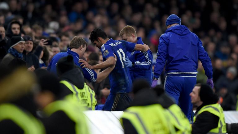 Chelsea's Diego Costa is helped from the field