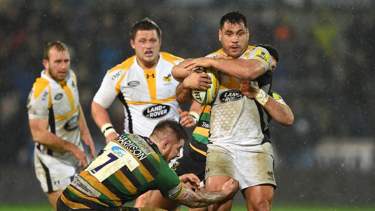 George Smith of Wasps is tackled by Gareth Denman of Northampton Saints