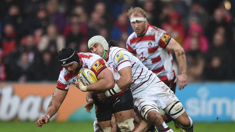 Gloucester No 8 Sione Kalamafoni is tackled by Blair Cowan