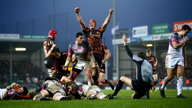 Exeter Chiefs players celebrate after Thomas Waldrom's crucial late try