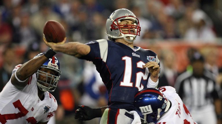 Patriots quarterback Tom Brady hounded by Giants' Osi Umenyiora and Justin Tuck