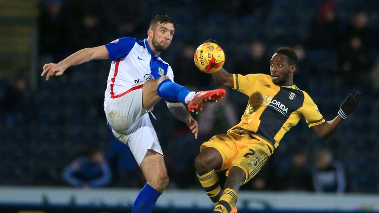 Shane Duffy and Moussa Dembele battle for the ball at Ewood Park